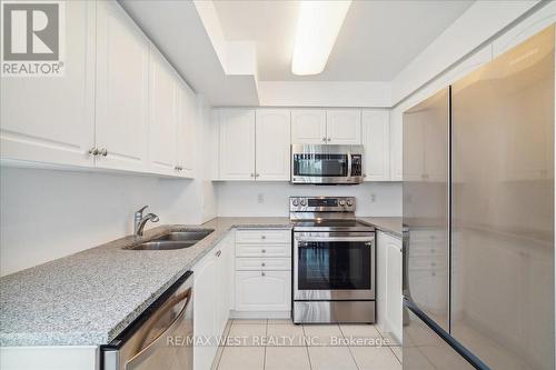 204 - 330 Red Maple Road, Richmond Hill (Langstaff), ON - Indoor Photo Showing Kitchen With Stainless Steel Kitchen With Double Sink