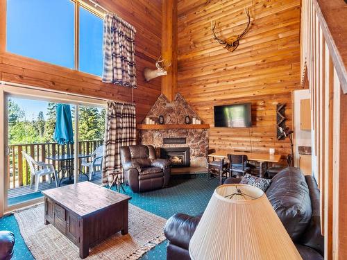 9B-7200 Roche Lake Road, Kamloops, BC - Indoor Photo Showing Living Room With Fireplace