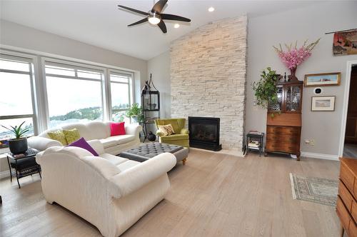 256-5165 Trepanier Bench Road, Peachland, BC - Indoor Photo Showing Living Room With Fireplace