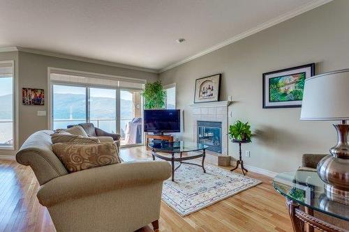 126-5300 Huston Road, Peachland, BC - Indoor Photo Showing Living Room With Fireplace