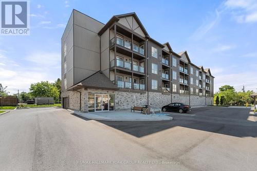 306 - 110 Grew Boulevard, Georgina, ON - Outdoor With Balcony