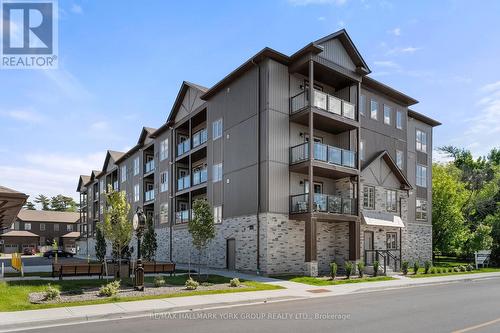 306 - 110 Grew Boulevard, Georgina, ON - Outdoor With Balcony With Facade