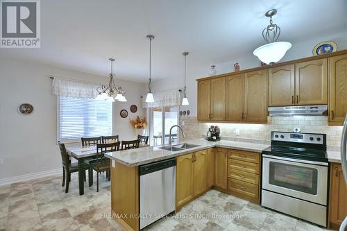 37 Tona Trail, Wasaga Beach, ON - Indoor Photo Showing Kitchen With Stainless Steel Kitchen With Double Sink