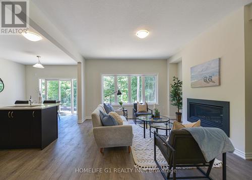 315 Beechwood Forest Lane, Gravenhurst, ON - Indoor Photo Showing Living Room With Fireplace