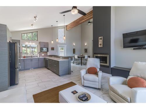 147 The Whins, Cranbrook, BC - Indoor Photo Showing Living Room With Fireplace