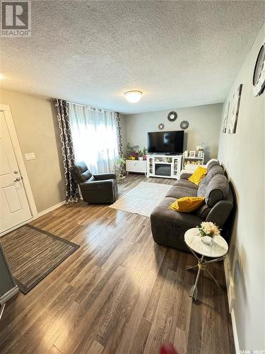 1109 Macklem Drive, Saskatoon, SK - Indoor Photo Showing Living Room With Fireplace