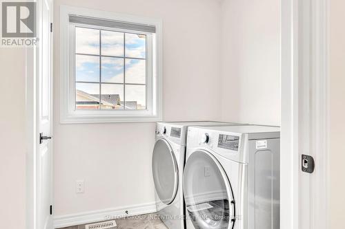 16 Samuel Crescent, Springwater (Centre Vespra), ON - Indoor Photo Showing Laundry Room