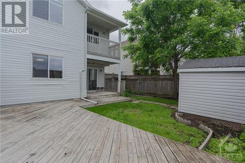 big/fenced back yard with nice fence - 132 Castle Glen Crescent, Kanata, ON - Outdoor With Balcony With Exterior