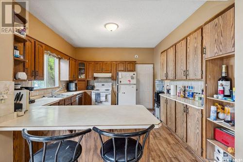 411 15Th Street W, Prince Albert, SK - Indoor Photo Showing Kitchen With Double Sink
