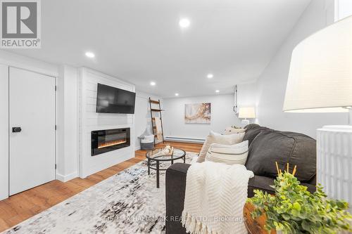 12 Shelley Drive, Kawartha Lakes, ON - Indoor Photo Showing Living Room With Fireplace