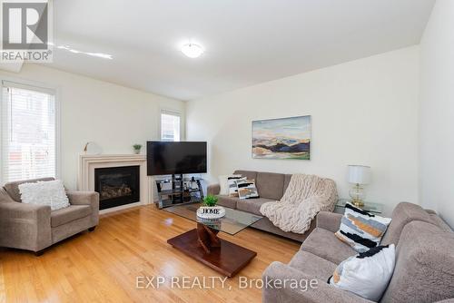 4 Friendly Way, Brampton, ON - Indoor Photo Showing Living Room With Fireplace