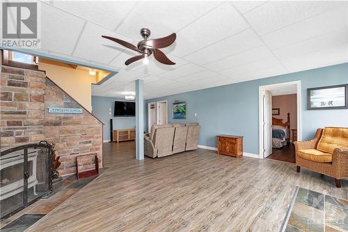 145 Appel Lane, Greater Madawaska, ON - Indoor Photo Showing Other Room With Fireplace