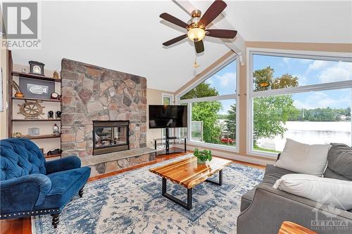 145 Appel Lane, Greater Madawaska, ON - Indoor Photo Showing Living Room With Fireplace