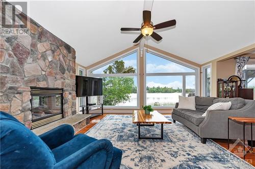 145 Appel Lane, Greater Madawaska, ON - Indoor Photo Showing Living Room With Fireplace