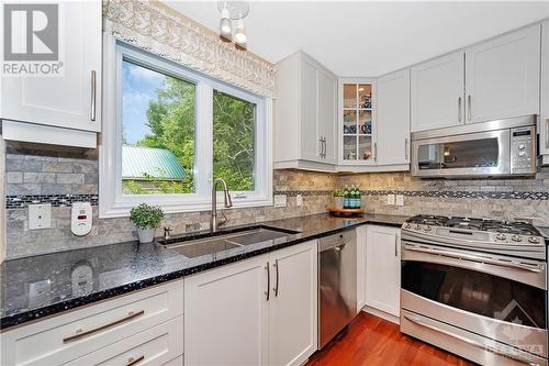 145 Appel Lane, Greater Madawaska, ON - Indoor Photo Showing Kitchen With Double Sink