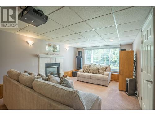 9094 North Nechako Road, Prince George, BC - Indoor Photo Showing Living Room With Fireplace