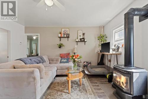 12147 St. Jacques Street, Tecumseh, ON - Indoor Photo Showing Living Room With Fireplace