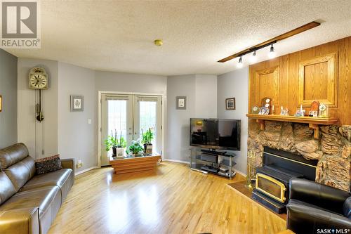 318 Wakabayashi Crescent, Saskatoon, SK - Indoor Photo Showing Living Room With Fireplace