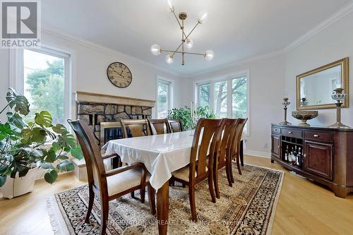 12 Kenton Drive, Toronto (Newtonbrook West), ON - Indoor Photo Showing Dining Room With Fireplace