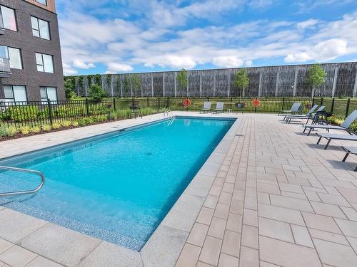 Pool - 109-3025 Av. Des Gouverneurs, Laval (Duvernay), QC - Outdoor With In Ground Pool