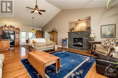 328 Humphries Road, Renfrew, ON - Indoor Photo Showing Living Room With Fireplace