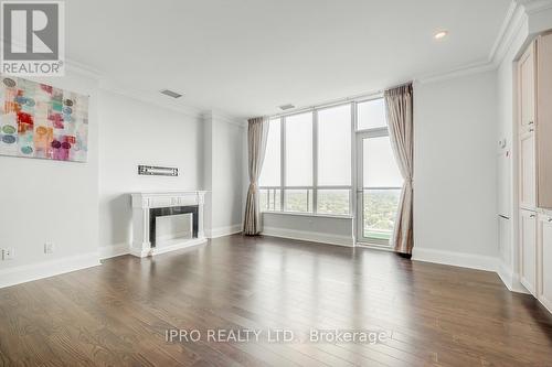 Gph22 - 100 Harrison Garden Boulevard, Toronto (Willowdale East), ON - Indoor Photo Showing Living Room With Fireplace