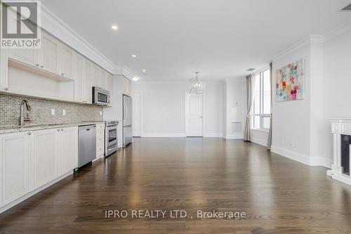 Gph22 - 100 Harrison Garden Boulevard, Toronto (Willowdale East), ON - Indoor Photo Showing Kitchen With Fireplace With Upgraded Kitchen