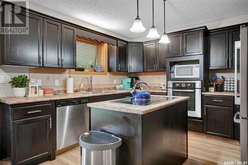 231 Marcotte Way, Saskatoon, SK - Indoor Photo Showing Kitchen With Upgraded Kitchen