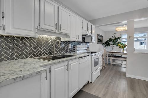 101-1610 Gordon Drive, Kelowna, BC - Indoor Photo Showing Kitchen With Double Sink