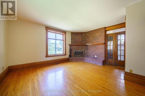 441 Queen Street, Perth South (51 - Blanshard Twp), ON - Indoor Photo Showing Living Room With Fireplace