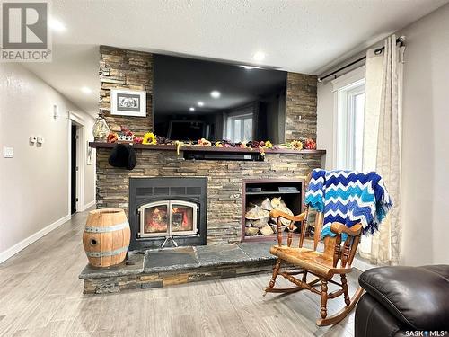 201 Prairie Street, Yellow Grass, SK - Indoor Photo Showing Living Room With Fireplace