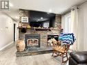 201 Prairie Street, Yellow Grass, SK  - Indoor Photo Showing Living Room With Fireplace 