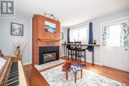 26 Glendale Avenue, Deep River, ON - Indoor Photo Showing Living Room With Fireplace