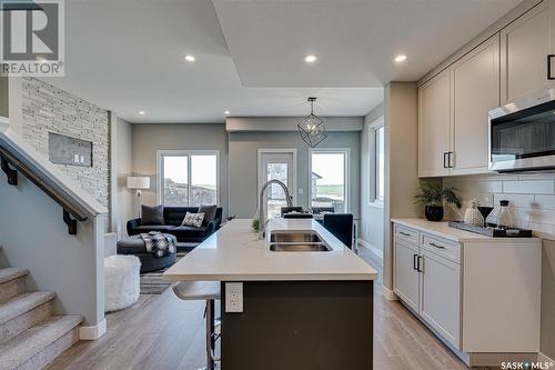 3225 Green Turtle Road, Regina, SK - Indoor Photo Showing Kitchen With Double Sink With Upgraded Kitchen