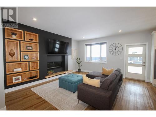 1008 87 Avenue, Dawson Creek, BC - Indoor Photo Showing Living Room With Fireplace