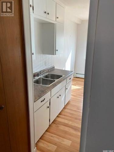 113 3Rd Street E, St. Walburg, SK - Indoor Photo Showing Kitchen With Double Sink