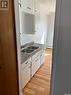 113 3Rd Street E, St. Walburg, SK  - Indoor Photo Showing Kitchen With Double Sink 