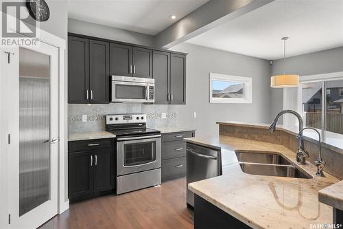 338 Pichler Crescent, Saskatoon, SK - Indoor Photo Showing Kitchen With Double Sink