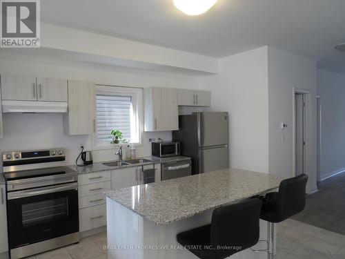 22 Alaskan Heights, Barrie (Holly), ON - Indoor Photo Showing Kitchen With Double Sink