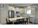 6 105 Forest Ridge Road, 100 Mile House, BC  - Indoor Photo Showing Kitchen With Double Sink 