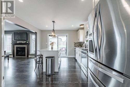 181 Gilmour Drive, Lucan Biddulph (Lucan), ON - Indoor Photo Showing Other Room With Fireplace