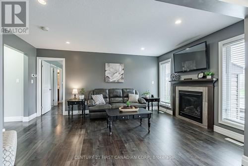 181 Gilmour Drive, Lucan Biddulph (Lucan), ON - Indoor Photo Showing Living Room With Fireplace