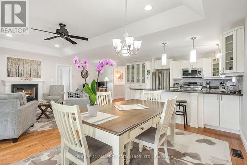 13 Baldwin Place, Cramahe (Colborne), ON - Indoor Photo Showing Dining Room With Fireplace