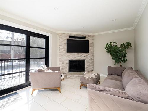 Family room - 441 Montrose Drive, Beaconsfield, QC - Indoor Photo Showing Living Room With Fireplace