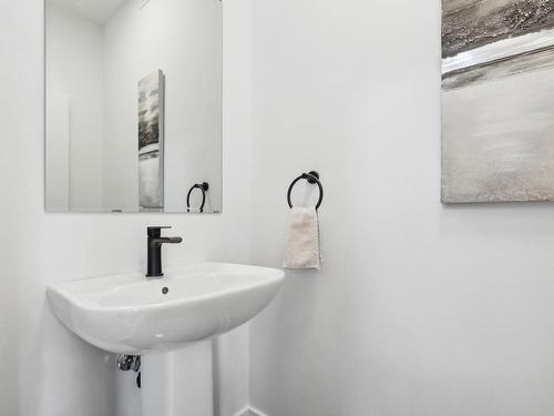Powder room - 189 Ch. De L'Envolée, L'Ange-Gardien, QC - Indoor Photo Showing Bathroom