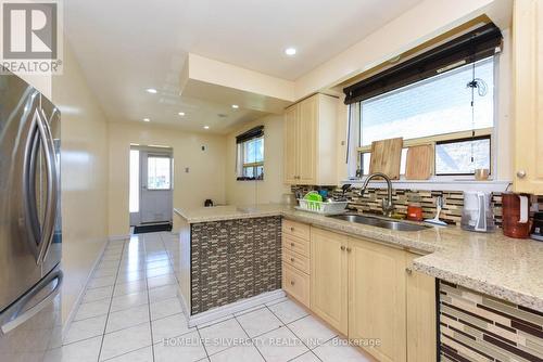 7714 Redstone Road, Mississauga, ON - Indoor Photo Showing Kitchen With Double Sink