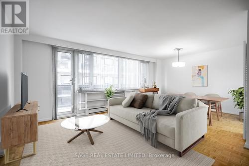 704 - 575 Avenue Road, Toronto (Yonge-St. Clair), ON - Indoor Photo Showing Living Room