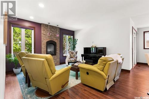 3525 Evans Court, Regina, SK - Indoor Photo Showing Living Room With Fireplace