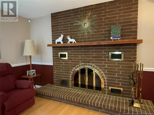 60 Lily Avenue, Edmundston, NB - Indoor With Fireplace