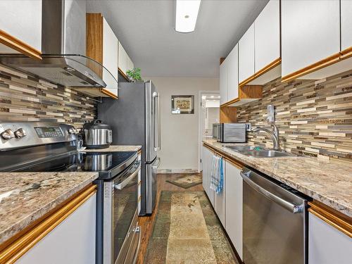 107-2035 Baron Road, Kelowna, BC - Indoor Photo Showing Kitchen With Double Sink